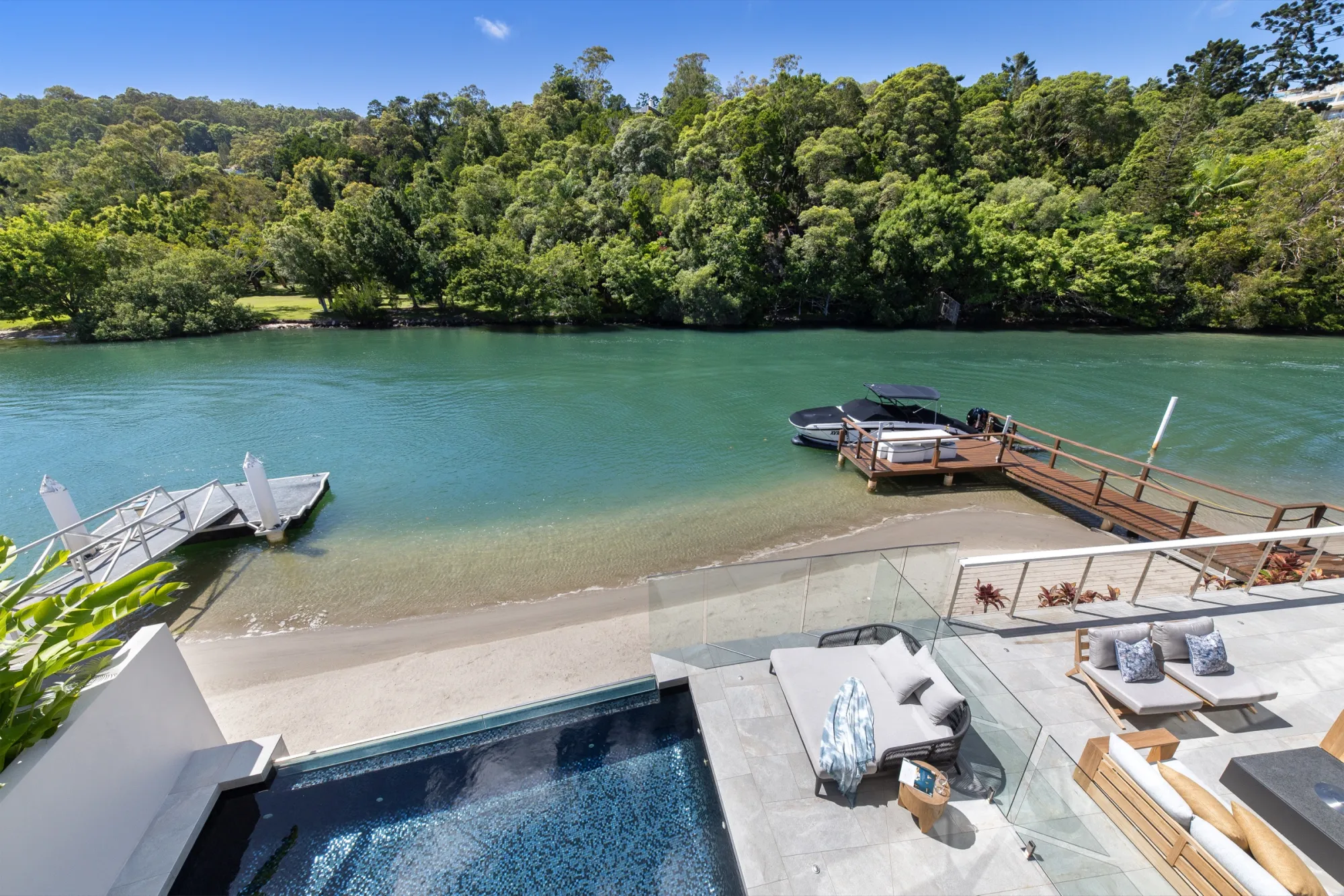 Heated infinity pool overlooking the Noosa River