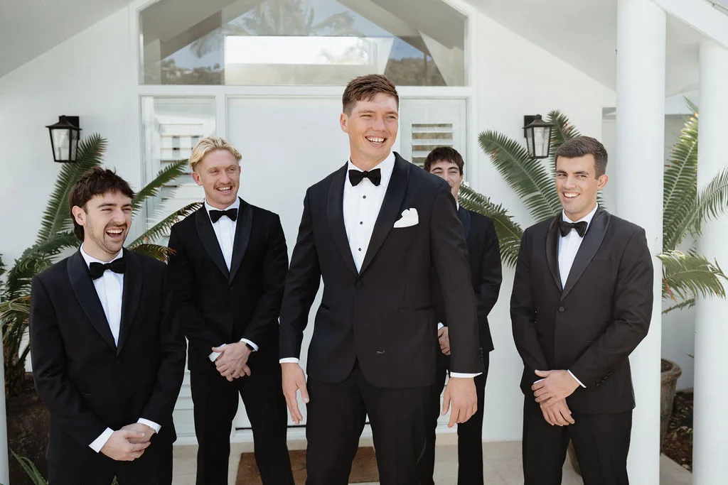 Groomsmen portrait at the residence entrance